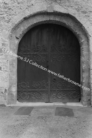 LISMORE CASTLE  ENTRANCE TO COURTYARD WITH CELTIC CARVINGS